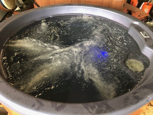Used 2011 Caldera Lina Spa filled, with jets running